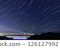 Night view with stars and airplane trails 126127992