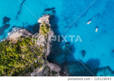 Top drone view of boats and yacths in transparent azure water 126128043