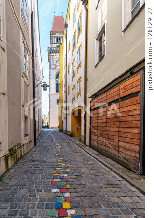 The very narrow, historic hell alley in the old town of Passau, Germany. Here the working craftsmen lived. The very narrow, historic hell alley in the old town of Passau, Germany. Here the working craftsmen lived. 126129122