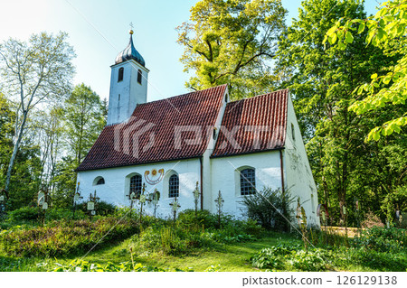 Church St.Clemens in Kranzberg near Freising, Bavaria with ancient graveyard and beautiful old wrought iron crosses 126129138