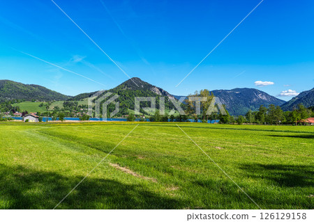 Hiking trail around Lake Schliersee in the bavarian alps at Schliersee, Upper Bavaria, Germany in Europe 126129158