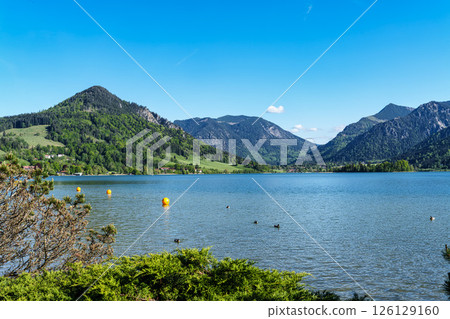 Hiking trail around Lake Schliersee in the bavarian alps at Schliersee, Upper Bavaria, Germany in Europe 126129160
