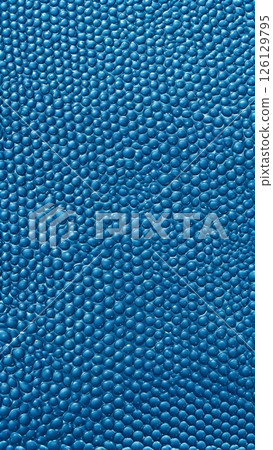 Blue glossy bubble texture with reflective surface. Abstract liquid pattern with round shapes. Close-up macro background for design 126129795