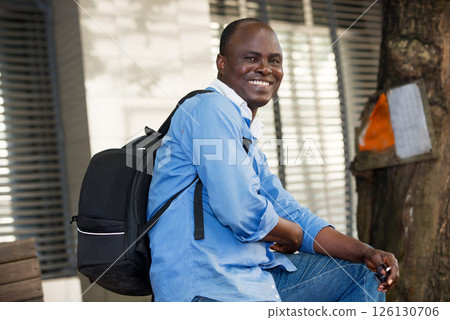 portrait of young adult, smiling. 126130706