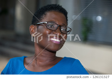 close-up of young woman, happy. 126131327