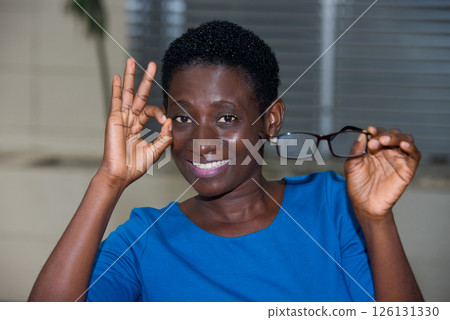 close-up of young woman, smiling. 126131330