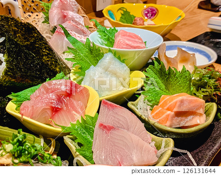 Assorted sashimi at an izakaya 126131644