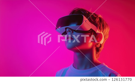 Youthful Experience In Virtual Reality: A Young Boy In Vr Glasses In Neon Light Setting, Representing Future Of Gaming And Technology. 126131770
