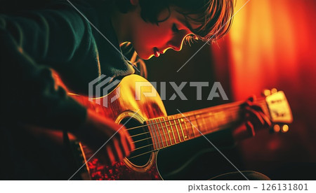 Enthusiastic European Boy Adolescence Engages In Cross Processing While Playing Guitar. A Youth With European Features Eagerly Performs On The Guitar In A Unique Cross-Processing Technique. 126131801