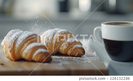 Delicious Baked Croissants And Rich Black Coffee Set On A Kitchen Table 126132286
