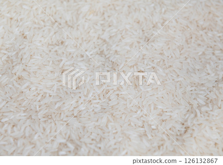 Top view of white rice seed texture background 126132867