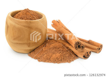 Cinnamon sticks with powder in wooden bowl isolated on white background with full depth of field Cinnamon sticks with powder in wooden bowl isolated on white background with full depth of field 126132974