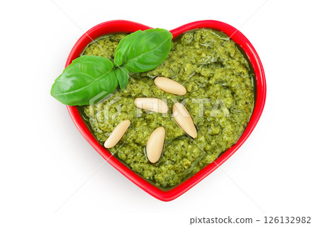 Pesto sauce in ceramic bowl isolated on white background. Top view. Flat lay. 126132982
