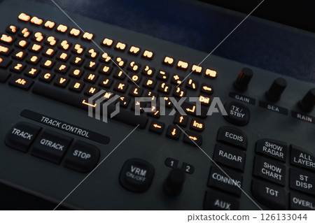 Marine navigation simulator. Close-up of an advanced control panel Marine navigation simulator. Close-up of an advanced control panel 126133044