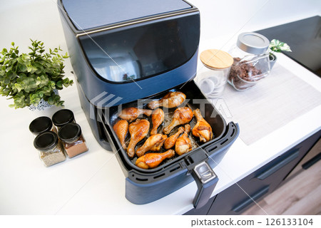 Air fryer machine in the kitchen 126133104