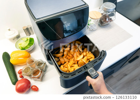 Air fryer machine in the kitchen 126133110