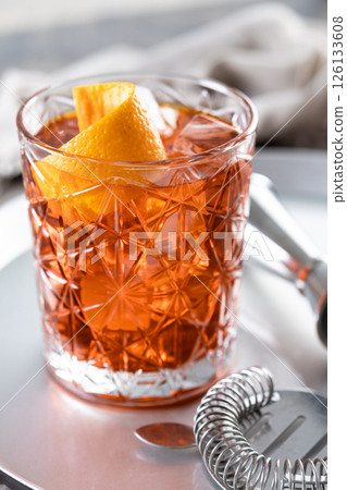 Americano cocktail garnished with twist orange Americano cocktail garnished with twist orange 126133608