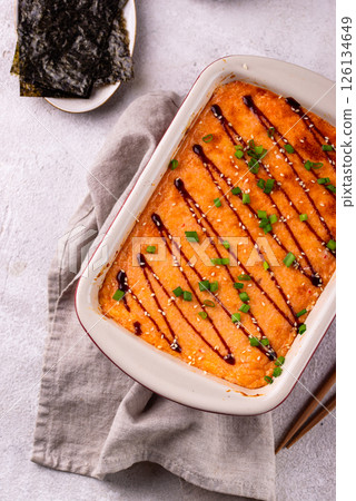 Baked sushi roll cake with crab surimi sticks 126134649