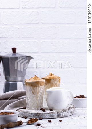 Dalgona whipped coffee with milk 126134690