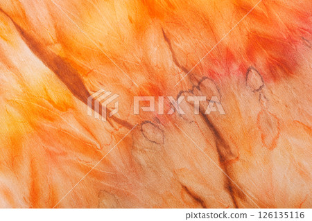 abstract pattern on silk fabric texture in yellow and brown tones 126135116