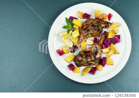 Duck legs with fruits. Duck legs with fruits. 126136308