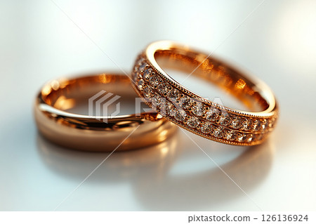 Pair of Wedding Rings on a white background. 126136924