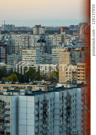 urban landscape with tall buildings and several trees, residential area, multi-storey buildings. urban landscape with tall buildings and several trees, residential area, multi-storey buildings. 126137050