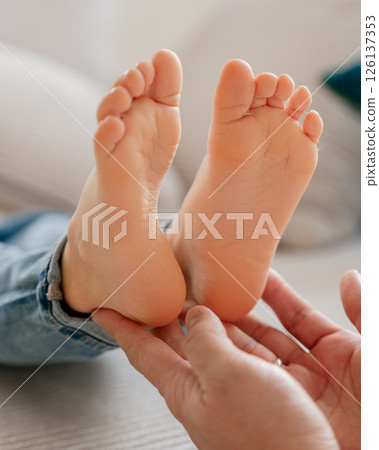 baby feet, boy feet, foot massage, dad tickles son's feet, foot tickling . High quality photo 126137353