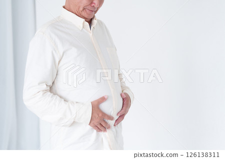 Senior man with a fat belly 126138311