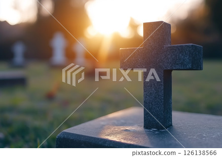 Cross Symbol in a Cemetery at Sunset Representing Christianity and Reflection on Life Cross Symbol in a Cemetery at Sunset Representing Christianity and Reflection on Life 126138566