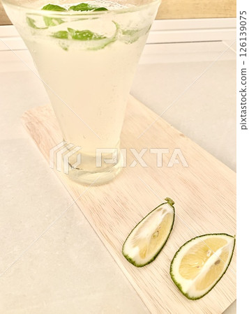Stock Photo: Cold mint drink with lime Stock Photo: Cold mint drink with lime 126139075