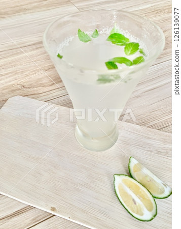 Stock Photo: Cold mint drink with lime Stock Photo: Cold mint drink with lime 126139077