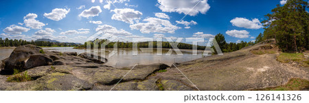 Lava rock formation known as the Love Stone on the bank of the Biya River in Altai, Russia. Concept of sacred natural landmarks and emotional symbolism in wild nature 126141326