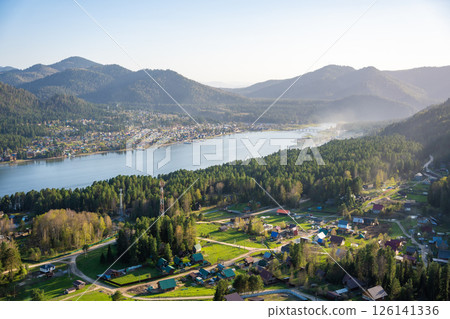 View from Tilan-Tuu mountain showing Biya river flowing into Teletskoye lake. Scenic natural landscape near Artybash town View from Tilan-Tuu mountain showing Biya river flowing into Teletskoye lake. Scenic natural landscape near Artybash town 126141336
