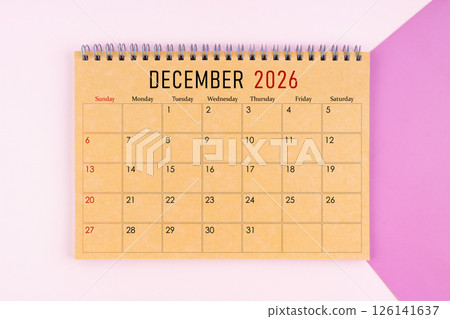 December 2026 desk calendar made from brown paper page on purple background. December 2026 desk calendar made from brown paper page on purple background. 126141637