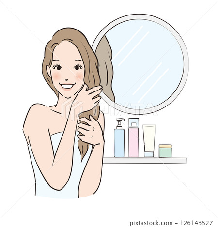A woman with long hair carefully taking care of her hair A woman with long hair carefully taking care of her hair 126143527