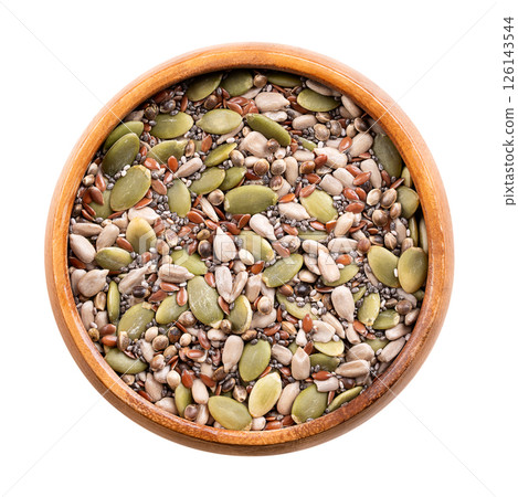 5-Seed snack mix, raw seeds and kernels in wooden bowl. Blend of sunflower and pumpkin kernels, flax and chia seeds, and whole hemp seeds. Crunchy snack, for smoothies, as topping or for baking. 126143544