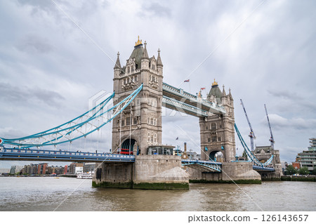 Tower Bridge Spans the Thames with Its Gothic Towers and Blue Cables, Remaining a Must-See Symbol of the City for Visitors in July 2023 Tower Bridge Spans the Thames with Its Gothic Towers and Blue Cables, Remaining a Must-See Symbol of the City for Visitors in July 2023 126143657