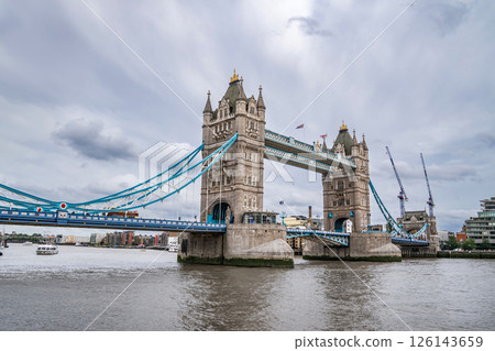 Tower Bridge Spans the Thames with Its Gothic Towers and Blue Cables, Remaining a Must-See Symbol of the City for Visitors in July 2023 Tower Bridge Spans the Thames with Its Gothic Towers and Blue Cables, Remaining a Must-See Symbol of the City for Visitors in July 2023 126143659