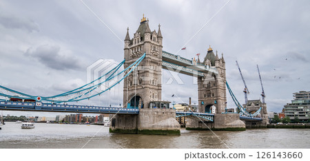 Tower Bridge Spans the Thames with Its Gothic Towers and Blue Cables, Remaining a Must-See Symbol of the City for Visitors in July 2023 Tower Bridge Spans the Thames with Its Gothic Towers and Blue Cables, Remaining a Must-See Symbol of the City for Visitors in July 2023 126143660