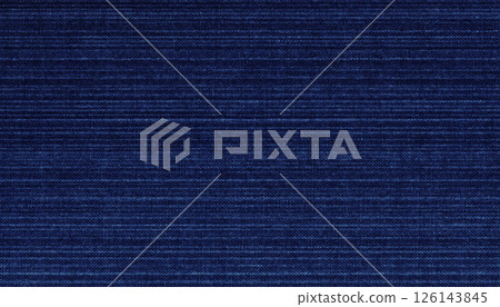 A gradation of the rough fabric of a karate uniform dyed with indigo that has faded horizontally 126143845