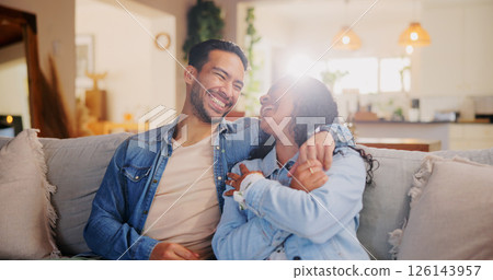 Laugh, couple and hug on sofa for love, relax and bonding together on weekend. Embrace, happy man and woman in home living room with funny joke for relationship, commitment and connection for support Laugh, couple and hug on sofa for love, relax and bonding together on weekend. Embrace, happy man and woman in home living room with funny joke for relationship, commitment and connection for support 126143957