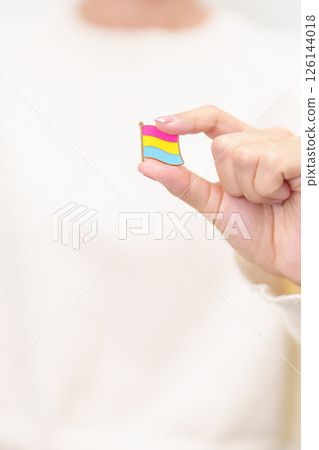Pansexual Visibility Day and Panromantic May Awareness Day and LGBT pride month concept. hand holding pink, yellow and blue heart shape for Lesbian, Gay, Bisexual, Transgender and Marriage Equality 126144018