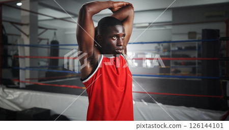 Stretching, boxer and fitness with black man in gym for mma fighter, workout or athlete practice. Wrestling warm up, martial arts club and sports with person at boxing ring for exercise and training 126144101