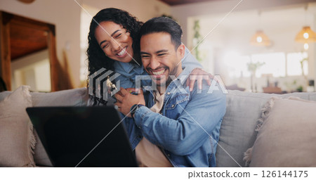Home, couple and hug with laptop for laughing, streaming online and check movie for bonding together. Sofa, woman and man with technology for entertainment website, platform and happiness with love 126144175
