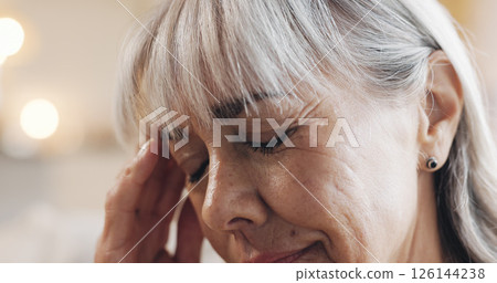 Elderly, woman and stress with headache in home for retirement debt, decision mistake and pressure. Old person, face and tension migraine with overthinking, overwhelmed and mental health with anxiety Elderly, woman and stress with headache in home for retirement debt, decision mistake and pressure. Old person, face and tension migraine with overthinking, overwhelmed and mental health with anxiety 126144238