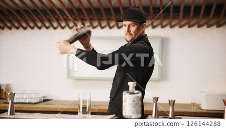 Cocktail, cafe and bartender man with shaker, glass and tools for artisan beverage recipe. Mixology, small business pub and barman at gin bar counter with happy hour drinks, process and craft alcohol 126144288