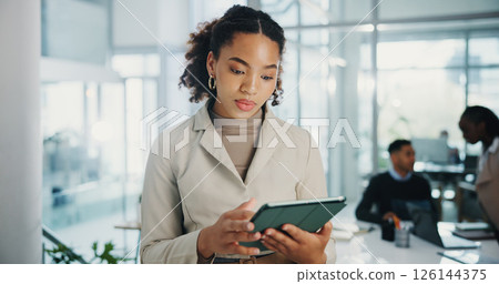 Business woman, tablet and scroll at meeting, agenda and review with proposal for deal at company. Person, touchscreen and reading with application for feedback, insight and notes at financial agency Business woman, tablet and scroll at meeting, agenda and review with proposal for deal at company. Person, touchscreen and reading with application for feedback, insight and notes at financial agency 126144375