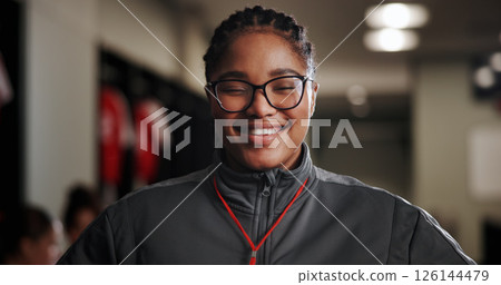 Happy woman, portrait and coach with soccer team for sport coordinator in locker room. Female person, football trainer or manager with smile or glasses for tournament game, match or competition Happy woman, portrait and coach with soccer team for sport coordinator in locker room. Female person, football trainer or manager with smile or glasses for tournament game, match or competition 126144479