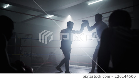 Learning, team and health with men in boxing ring for sparring practice, boxer training and fitness coaching. Mma club, sports and martial arts fighter with people in gym for personal trainer 126144500